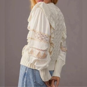 Anthropologie Cream sweater with ruffles and mock neck